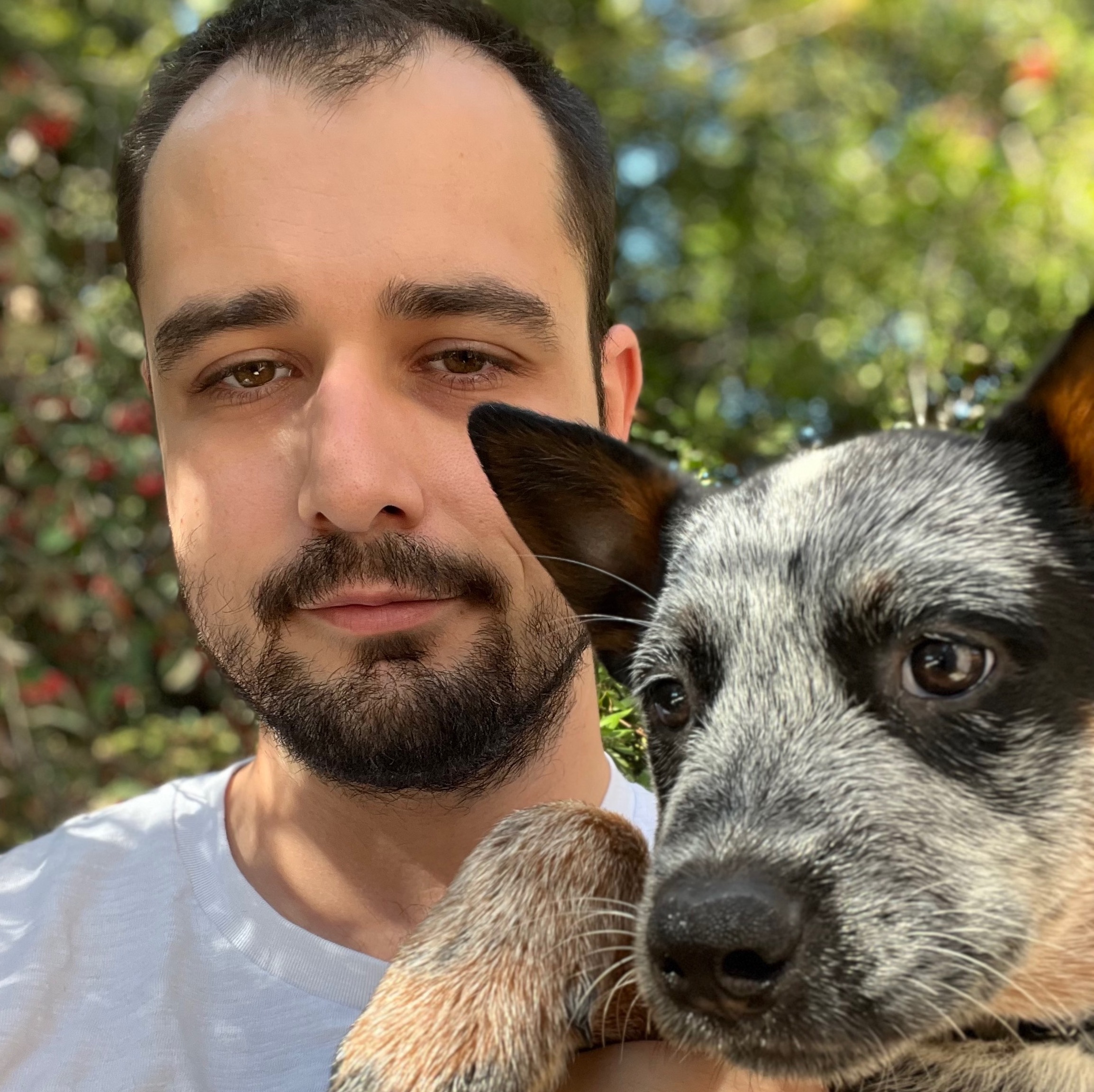 Portrait of Rory Van Blaricom and his dog, Pancake.